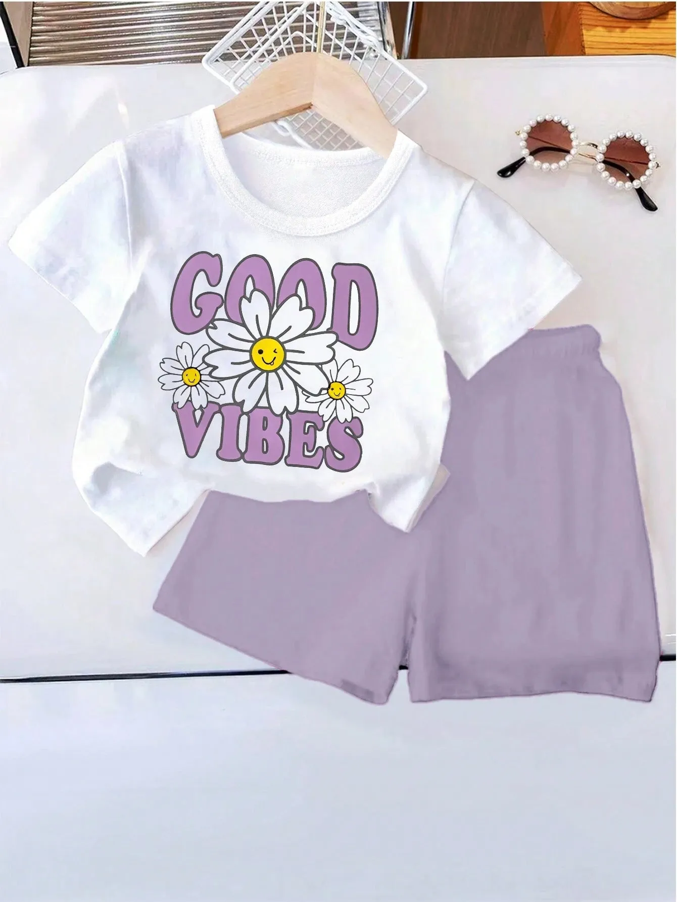 2pcs Young Girl Fashionable And Cute Face, Flowers & Letter Print Comfortable Round Neck Short Sleeve T-Shirt And Shorts Set, Summer Vacation